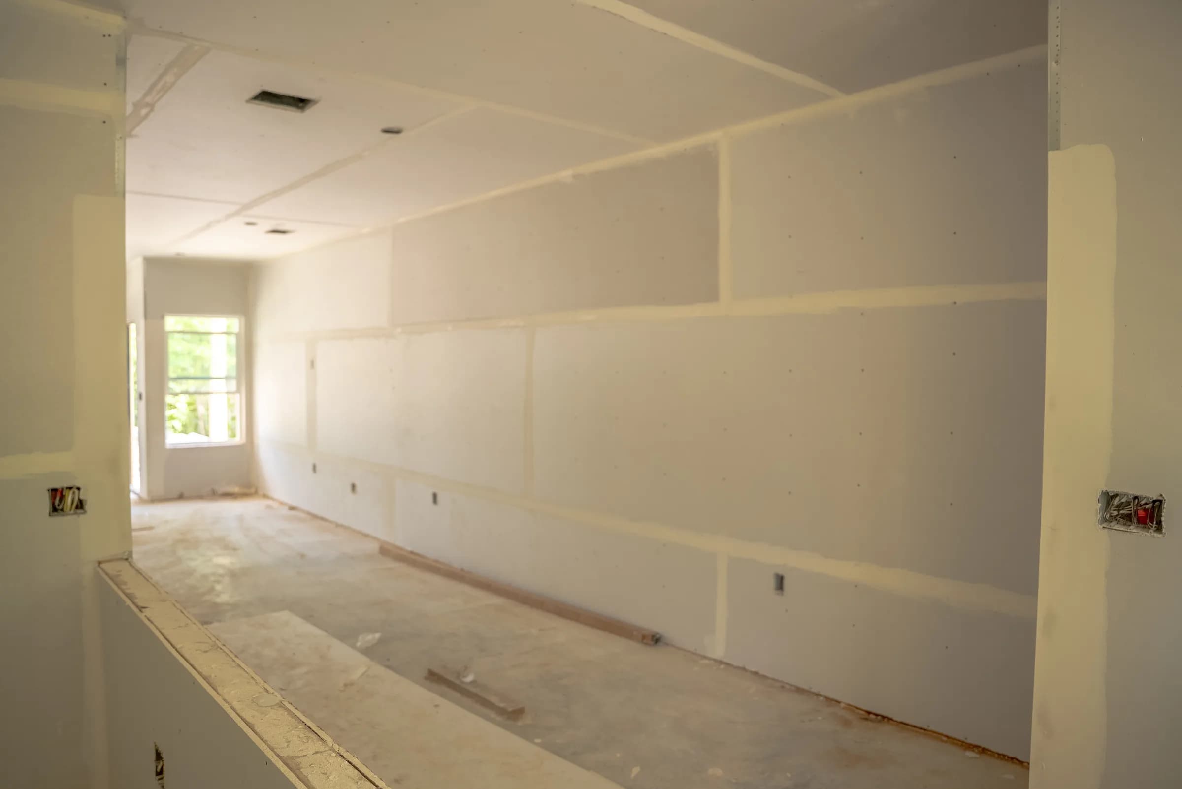 Great room with fresh drywall